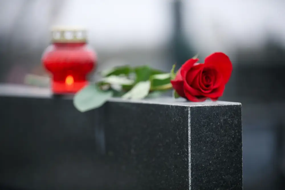monument with rose on top